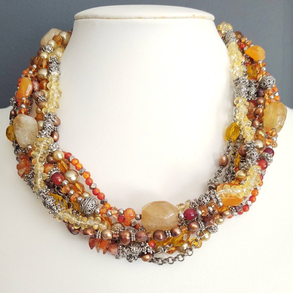 8 strand orange, yellow, gold and silver beaded necklace